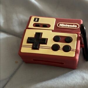 Nintendo Classic Controller Keychain - Red and Creamwith apple AirPods Pro’s
